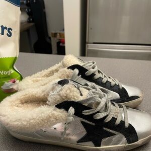 Golden goose Ball Star Sabots with shearling lining.